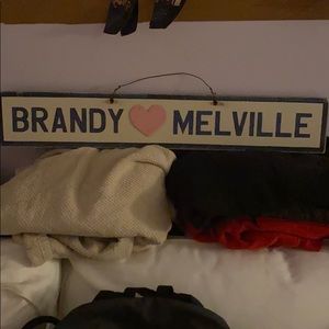 Brandy Melville weathered sign